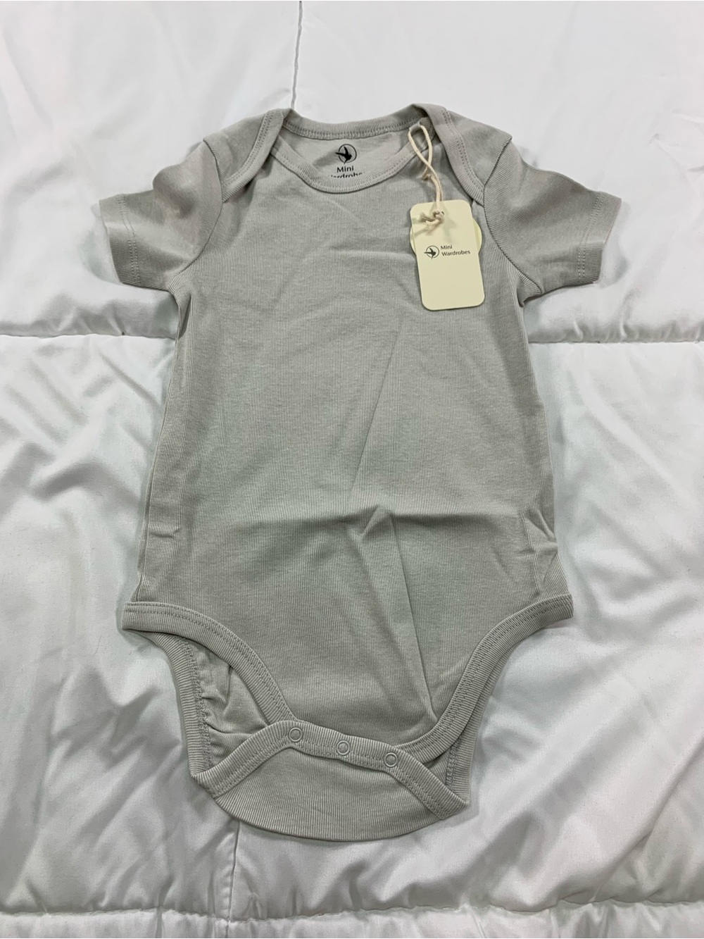 New Mini Wardrobes onesie size 18–24
